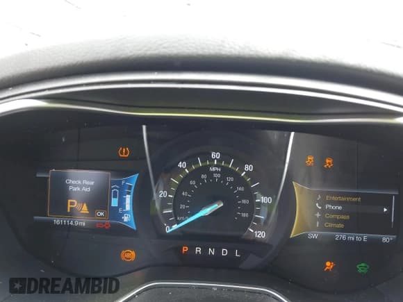 ✅ 2015 Ford Fusion Titanium Hybrid • VIN: 3FA6P0RUXFR126960 • Lot: 42420787. Wystawiony na IAAI z przebiegiem 161 114 mil. Bezpłatny archiwum sprzedaży aukcyjnych z USA i szczegółowy raport historii pojazdu na DreamBid. Zdjęcie 7.