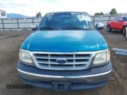 ✅ 1999 Ford F-150 XL • VIN: 2FTRX17L3XCA17712 • Lot: 42956465. Listed on IAAI with 181,617 mi. Free auction sales archive from the USA and detailed vehicle history report at DreamBid. Image 12.