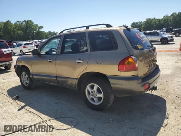 ✅ 2004 Hyundai Santa Fe GLS • VIN: KM8SC13E14U618502 • Lot: 53357435. Listed on Copart with 160,672 mi. Free auction sales archive from the USA and detailed vehicle history report at DreamBid. Image 2.