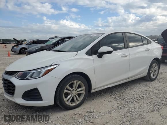 ✅ 2019 Chevrolet Cruze LS • VIN: 1G1BC5SMXK7102289 • Lot: 86277365. Listed on Copart with 145,500 mi. Free auction sales archive from the USA and detailed vehicle history report at DreamBid. Image 1.