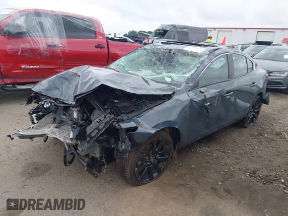 ✅ 2023 Mazda 3 S Carbon Edition • VIN: 3MZBPBCM4PM360102 • Лот: 42470237. Опубликован ранее на IAAI с пробегом Не указан. Бесплатный доступ к архиву аукционных продаж из США и подробный отчёт об истории автомобиля на DreamBid. Изображение 2.