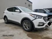 ✅ 2017 Hyundai Santa Fe 2.4L • VIN: 5XYZUDLB4HG418390 • Лот: 55275014. Опубликован ранее на Copart с пробегом 69 981 миль. Бесплатный доступ к архиву аукционных продаж из США и подробный отчёт об истории автомобиля на DreamBid. Изображение 4.