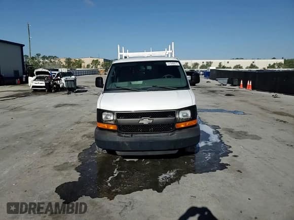 ✅ 2014 Chevrolet Express Cargo • VIN: 1GCWGFBA3E1147865 • Lot: 51949675. Listed on Copart with 128,578 mi. Free auction sales archive from the USA and detailed vehicle history report at DreamBid. Image 15.