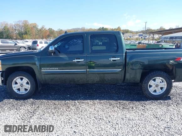 2013 Chevrolet Silverado 1500 LT z VIN 3GCPKSE72DG258905, wystawiony jako IAAI lot #43492550 z przebiegiem 170 811 mil mil oraz . Historia ofert i sprzedaży dostępna na DreamBid. Obrazek 14.