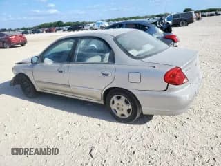 ✅ 2003 Kia Spectra • VIN: KNAFB121X35230410 • Лот: 70925065. Опубликован ранее на Copart с пробегом 135 766 миль. Бесплатный доступ к архиву аукционных продаж из США и подробный отчёт об истории автомобиля на DreamBid. Изображение 2.