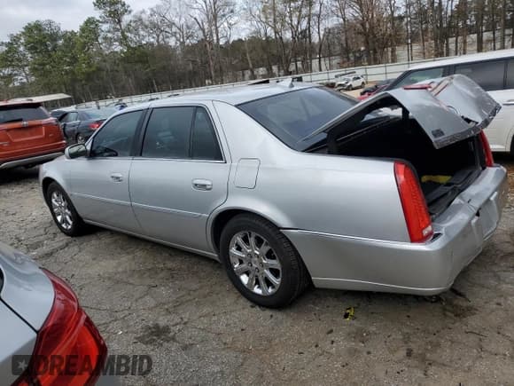 ✅ 2009 Cadillac DTS 1SA • VIN: 1G6KD57Y49U143001 • Lot: 47517295. Listed on Copart with 148,892 mi. Free auction sales archive from the USA and detailed vehicle history report at DreamBid. Image 2.
