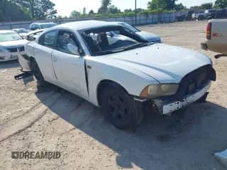 2012 Dodge Charger Police with VIN 2C3CDXAT5CH180468, listed as a IAAI auction lot 43199963 with 125,447 mi miles and . Bid and sale history available at DreamBid. Image 1.