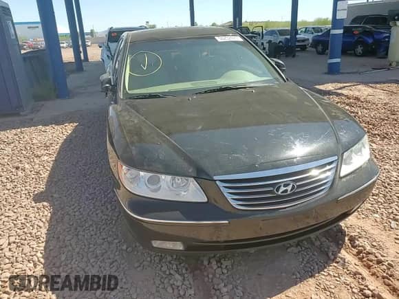 2009 Hyundai Azera Limited с VIN KMHFC46F49A388051, выставлен на аукционе Copart как лот 56252425 с пробегом 177 171 миль миль и Списание • Salvage title. История ставок и продаж доступна на DreamBid. Изображение 13.