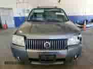 2006 Mercury Mariner Convenience with VIN 4M2YU56Z96DJ03164, listed as a Copart auction lot 69500635 with 212,923 mi miles and Salvage title. Bid and sale history available at DreamBid. Image 5.