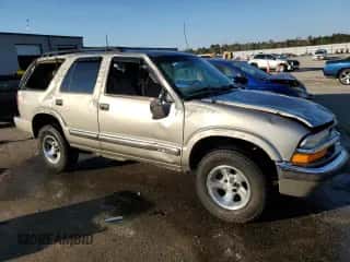 2001 Chevrolet Blazer LS z VIN 1GNCS13W71K244416, wystawiony jako Copart lot #77312694 z przebiegiem 194 740 mil mil oraz Szkoda całkowita • Salvage title. Historia ofert i sprzedaży dostępna na DreamBid. Obrazek 4.