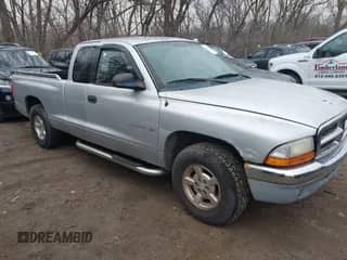 2002 Dodge Dakota SLT с VIN 1B7GL42N42S504550, выставлен на аукционе IAAI как лот 41552476 с пробегом 162 325 миль миль и . История ставок и продаж доступна на DreamBid. Изображение 1.