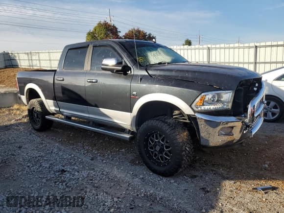 ✅ 2015 Ram 2500 Laramie • VIN: 3C6UR5FLXFG614653 • Lot: 89804655. Listed on Copart with 207,152 mi. Free auction sales archive from the USA and detailed vehicle history report at DreamBid. Image 4.