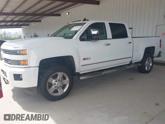 ✅ 2018 Chevrolet Silverado 2500HD LT • VIN: 1GC1KVEG0JF262469 • Lot: 41835871. Listed on IAAI with 122,228 mi. Free auction sales archive from the USA and detailed vehicle history report at DreamBid. Image 2.