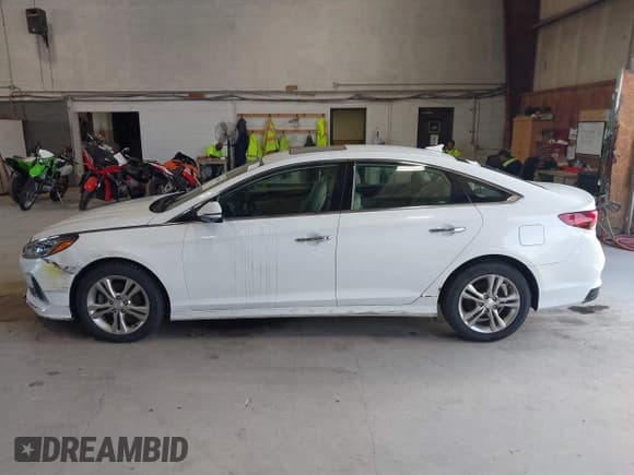 ✅ 2018 Hyundai Sonata SEL • VIN: 5NPE34AF8JH668432 • Lot: 42983335. Listed on IAAI with 57,185 mi. Free auction sales archive from the USA and detailed vehicle history report at DreamBid. Image 14.
