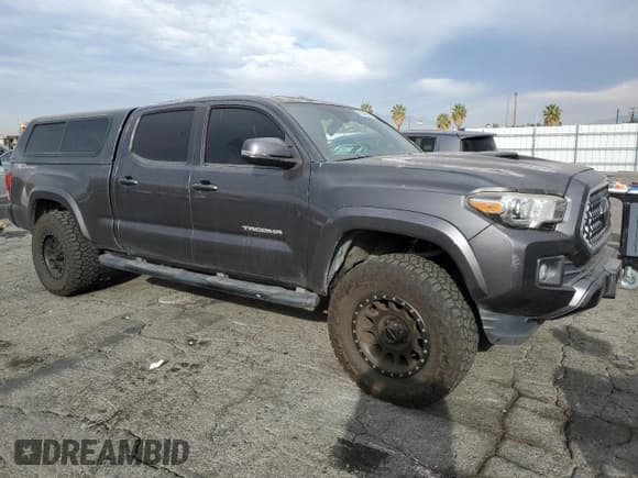 ✅ 2018 Toyota Tacoma TRD Sport • VIN: 3TMBZ5DN8JM017063 • Lot: 92426225. Listed on Copart with 64,878 mi. Free auction sales archive from the USA and detailed vehicle history report at DreamBid. Image 4.