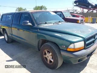 ✅ 2000 Dodge Dakota • VIN: 1B7GL22X0YS524339 • Lot: 42290146. Wystawiony na IAAI z przebiegiem 140 760 mil. Bezpłatny archiwum sprzedaży aukcyjnych z USA i szczegółowy raport historii pojazdu na DreamBid. Zdjęcie 1.