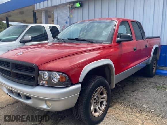 2004 Dodge Dakota SLT with VIN 1D7HG48N74S718165, listed as a Copart auction lot 73542004 with 213,326 mi miles and Clean title. Bid and sale history available at DreamBid. Image 2.