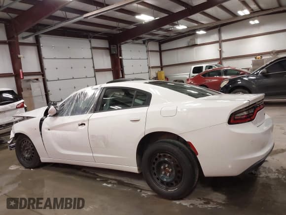 ✅ 2021 Dodge Charger Police • VIN: 2C3CDXKG7MH649112 • Lot: 42935599. Listed on IAAI with 23,819 mi. Free auction sales archive from the USA and detailed vehicle history report at DreamBid. Image 14.