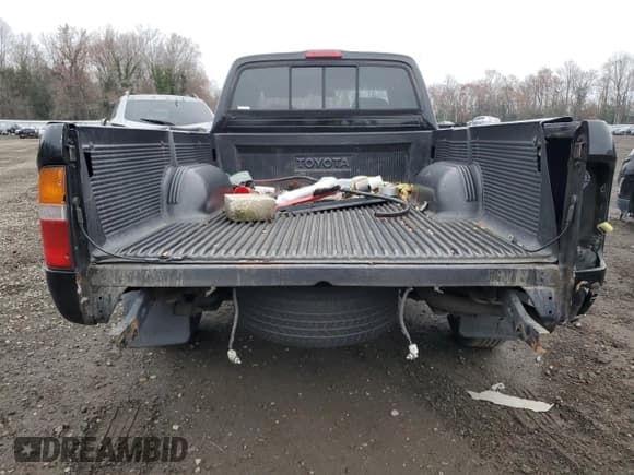 ✅ 1997 Toyota Tacoma • VIN: 4TAVL52N5VZ283416 • Lot: 93865885. Listed on Copart with 227,124 mi. Free auction sales archive from the USA and detailed vehicle history report at DreamBid. Image 6.