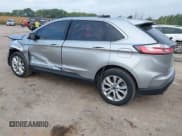 ✅ 2022 Ford Edge Titanium • VIN: 2FMPK4K99NBA41529 • Lot: 43242264. Listed on IAAI with 82,323 mi. Free auction sales archive from the USA and detailed vehicle history report at DreamBid. Image 3.