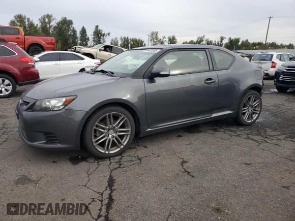 ✅ 2012 Scion tC • VIN: JTKJF5C70C3044875 • Lot: 85420385. Listed on Copart with 86,956 mi. Free auction sales archive from the USA and detailed vehicle history report at DreamBid. Image 1.