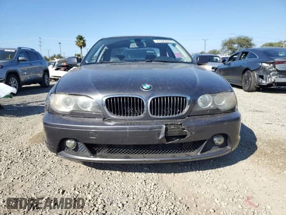 2006 BMW 3 Series 325Ci with VIN WBABD33426PL09754, listed as a Copart auction lot 71323315 with 150,243 mi miles and Salvage title. Bid and sale history available at DreamBid. Image 5.