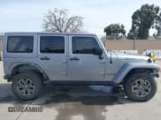 ✅ 2018 Jeep Wrangler Unlimited Rubicon Recon • VIN: 1C4HJWFG9JL840446 • Lot: 41804678. Listed on IAAI with 133,633 mi. Free auction sales archive from the USA and detailed vehicle history report at DreamBid. Image 14.