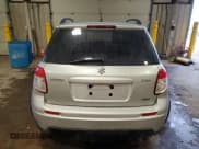 ✅ 2010 Suzuki SX4 • VIN: JS2YB5A31A6302436 • Lot: 88473455. Wystawiony na Copart z przebiegiem 78 839 mil. Bezpłatny archiwum sprzedaży aukcyjnych z USA i szczegółowy raport historii pojazdu na DreamBid. Zdjęcie 6.