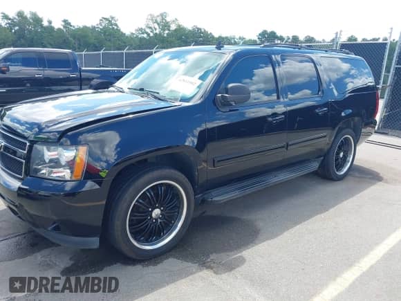 2014 Chevrolet Suburban LT z VIN 1GNSCJE06ER116005, wystawiony jako IAAI lot #42811502 z przebiegiem 153 197 mil mil oraz . Historia ofert i sprzedaży dostępna na DreamBid. Obrazek 17.