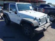 ✅ 2015 Jeep Wrangler Sport • VIN: 1C4AJWAG6FL553677 • Lot: 43601443. Listed on IAAI with 100,114 mi. Free auction sales archive from the USA and detailed vehicle history report at DreamBid. Image 1.