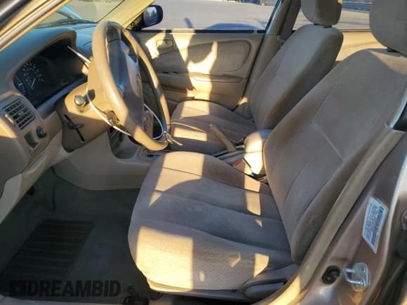 ✅ 1998 Toyota Corolla CE • VIN: 1NXBR12E0WZ083603 • Lot: 93094065. Wystawiony na Copart z przebiegiem 240 278 mil. Bezpłatny archiwum sprzedaży aukcyjnych z USA i szczegółowy raport historii pojazdu na DreamBid. Zdjęcie 7.