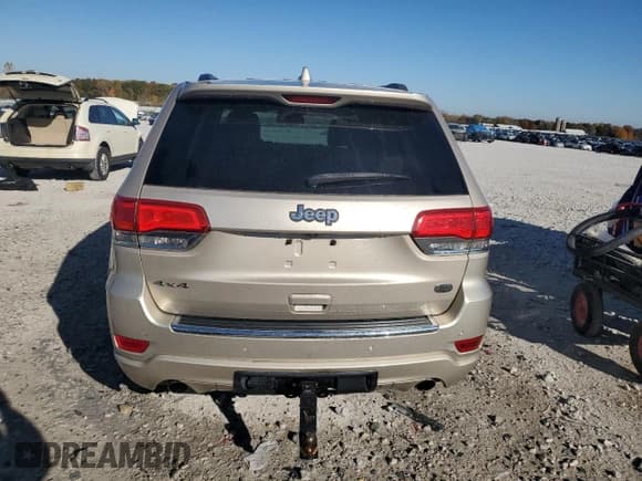 ✅ 2014 Jeep Grand Cherokee Overland • VIN: 1C4RJFCT9EC147999 • Lot: 89689645. Listed on Copart with 133,640 mi. Free auction sales archive from the USA and detailed vehicle history report at DreamBid. Image 6.