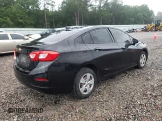 ✅ 2018 Chevrolet Cruze LS • VIN: 1G1BC5SM2J7235479 • Lot: 50653202. Listed on Copart with 90,188 mi. Free auction sales archive from the USA and detailed vehicle history report at DreamBid. Image 4.