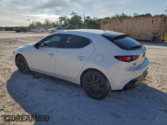 ✅ 2021 Mazda 3 Premium • VIN: JM1BPAML4M1306651 • Lot: 95499275. Listed on Copart with 32,050 mi. Free auction sales archive from the USA and detailed vehicle history report at DreamBid. Image 2.