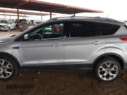 ✅ 2013 Ford Escape Titanium • VIN: 1FMCU0J92DUB64035 • Lot: 42023748. Listed on IAAI with 177,636 mi. Free auction sales archive from the USA and detailed vehicle history report at DreamBid. Image 14.