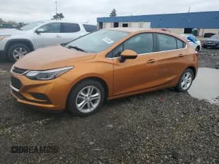 ✅ 2017 Chevrolet Cruze LT • VIN: 3G1BE6SM8HS607211 • Lot: 87453485. Listed on Copart with 50,353 mi. Free auction sales archive from the USA and detailed vehicle history report at DreamBid. Image 1.