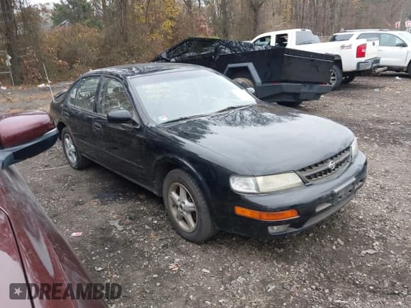 ✅ 1999 Nissan Maxima GXE • VIN: JN1CA21DXXT811811 • Lot: 43762107. Listed on IAAI with 183,329 mi. Free auction sales archive from the USA and detailed vehicle history report at DreamBid. Image 1.