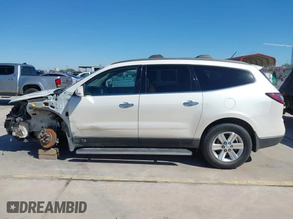 ✅ 2013 Chevrolet Traverse LT • VIN: 1GNKRJKD0DJ146474 • Lot: 43599335. Listed on IAAI with 102,254 mi. Free auction sales archive from the USA and detailed vehicle history report at DreamBid. Image 15.