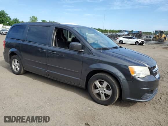2012 Dodge Grand Caravan SXT z VIN 2C4RDGCG4CR295109, wystawiony jako Copart lot #61629604 z przebiegiem 80 255 mil mil oraz Czysty tytuł • Clean title. Historia ofert i sprzedaży dostępna na DreamBid. Obrazek 4.