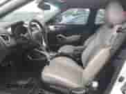 2013 Hyundai Veloster w/Gray Int с VIN KMHTC6AD3DU149988, выставлен на аукционе Copart как лот 72764624 с пробегом 30 503 миль миль и Списание • Salvage title. История ставок и продаж доступна на DreamBid. Изображение 7.