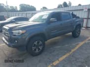 ✅ 2017 Toyota Tacoma SR5 • VIN: 3TMCZ5AN7HM115200 • Lot: 43115086. Listed on IAAI with 117,000 mi. Free auction sales archive from the USA and detailed vehicle history report at DreamBid. Image 18.