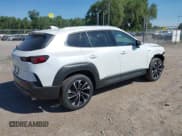 ✅ 2025 Mazda CX-50 Hybrid Premium Plus Package • VIN: 7MMVAAEWXSN109464 • Lot: 42707843. Listed on IAAI with 421 mi. Free auction sales archive from the USA and detailed vehicle history report at DreamBid. Image 4.