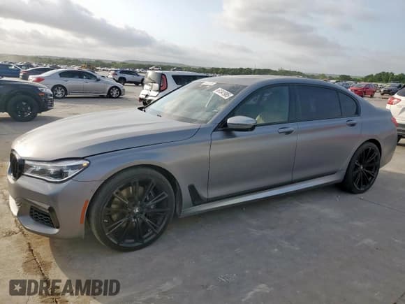 ✅ 2018 BMW 7 Series 750i • VIN: WBA7F0C52JGM23950 • Lot: 61341985. Listed on Copart with 70,268 mi. Free auction sales archive from the USA and detailed vehicle history report at DreamBid. Image 1.