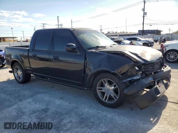 ✅ 2003 Ford F-150 Harley-Davidson • VIN: 1FTRW07333KC91740 • Lot: 45636205. Listed on Copart with 175,945 mi. Free auction sales archive from the USA and detailed vehicle history report at DreamBid. Image 4.