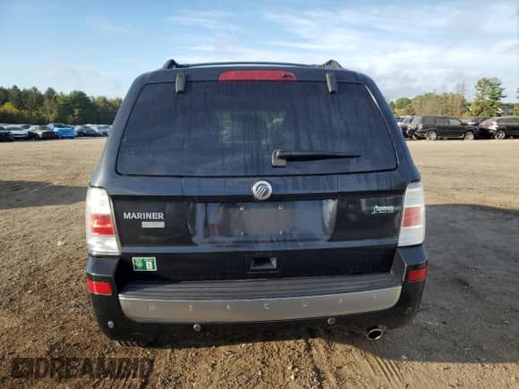 2011 Mercury Mariner Premier с VIN 4M2CN9HG9BKJ01463, выставлен на аукционе Copart как лот 84483315 с пробегом 112 556 миль миль и Списание • Salvage title. История ставок и продаж доступна на DreamBid. Изображение 6.