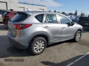 ✅ 2015 Mazda CX-5 Sport • VIN: JM3KE2BEXF0545136 • Лот: 93623125. Опубликован ранее на Copart с пробегом 172 330 миль. Бесплатный доступ к архиву аукционных продаж из США и подробный отчёт об истории автомобиля на DreamBid. Изображение 3.