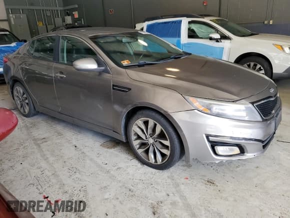 ✅ 2014 Kia Optima SX • VIN: 5XXGR4A74EG333007 • Лот: 83864825. Опубликован ранее на Copart с пробегом 233 067 миль. Бесплатный доступ к архиву аукционных продаж из США и подробный отчёт об истории автомобиля на DreamBid. Изображение 4.