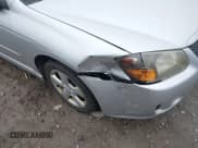 ✅ 2009 Kia Spectra EX • VIN: KNAFE222095027380 • Lot: 43730880. Listed on IAAI with 200,112 mi. Free auction sales archive from the USA and detailed vehicle history report at DreamBid. Image 6.