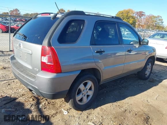 ✅ 2010 Kia Sportage LX • VIN: KNDKGCA3XA7718047 • Лот: 43673690. Опубликован ранее на IAAI с пробегом 196 544 миль. Бесплатный доступ к архиву аукционных продаж из США и подробный отчёт об истории автомобиля на DreamBid. Изображение 4.