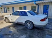 ✅ 1998 Buick Regal GS • VIN: 2G4WF5211W1465519 • Lot: 94824065. Listed on Copart with 129,303 mi. Free auction sales archive from the USA and detailed vehicle history report at DreamBid. Image 2.